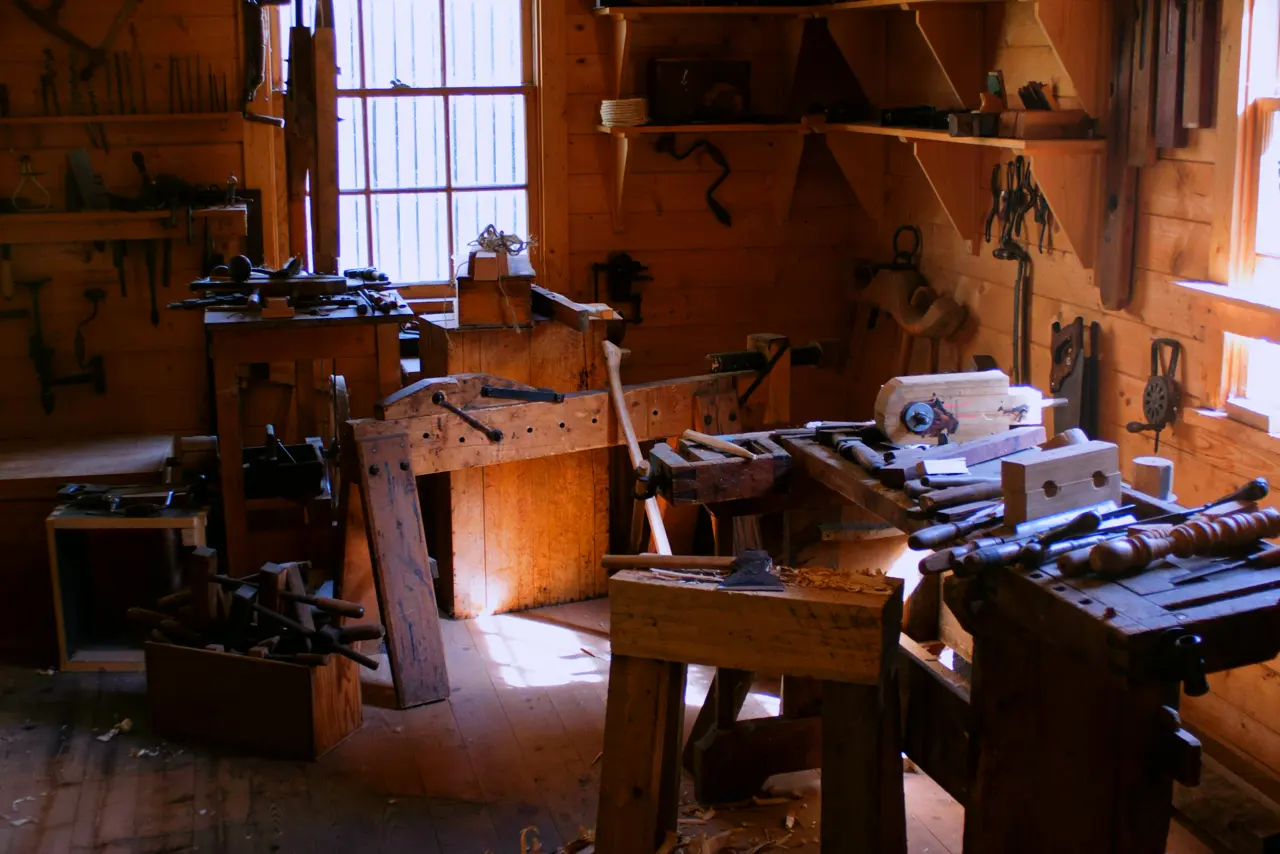 A woodworking shop with light through the windows