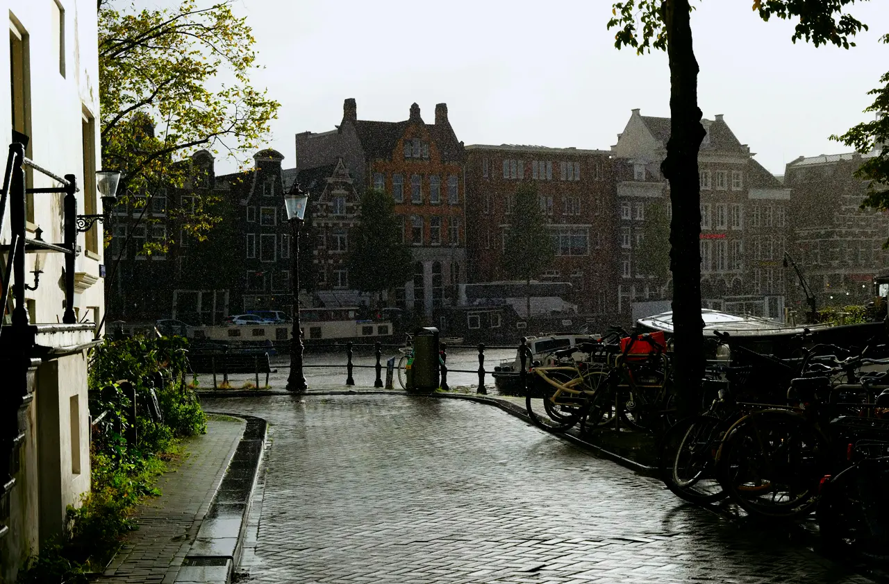 A wet square with bikes after the rain